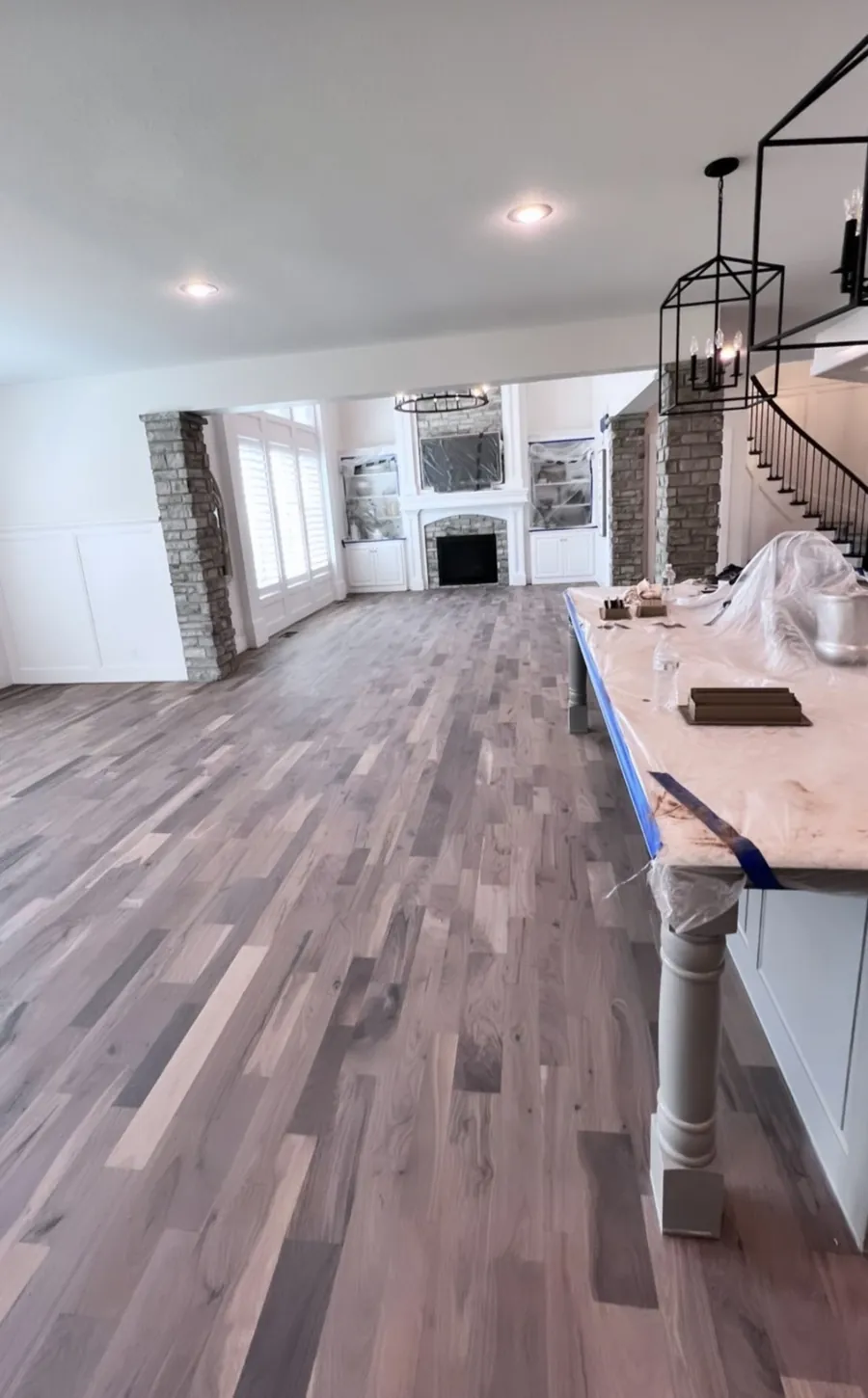 Gray-toned oak floor in an open kitchen