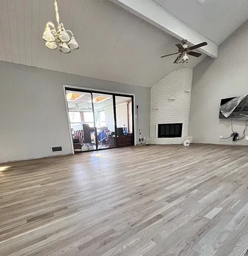 Gray-toned oak floor in a room with a vaulted ceiling