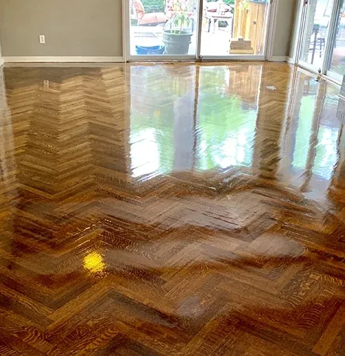 Herringbone hardwood with a fresh high-gloss finish